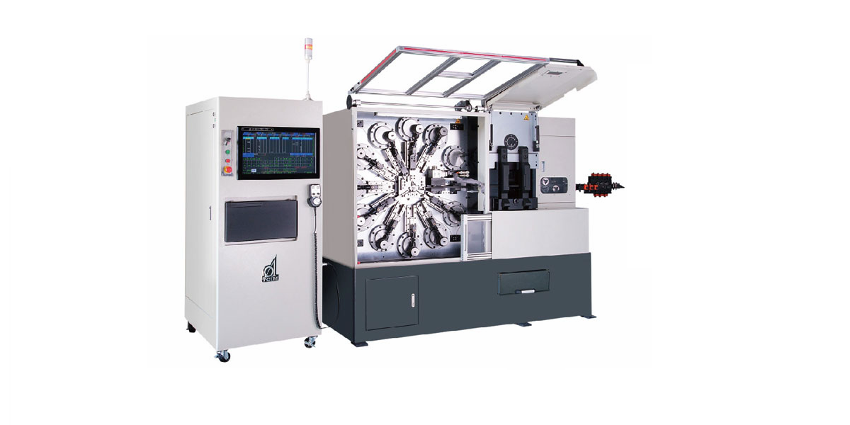 A CNC multi-slide forming machine on the production floor at Seyunda